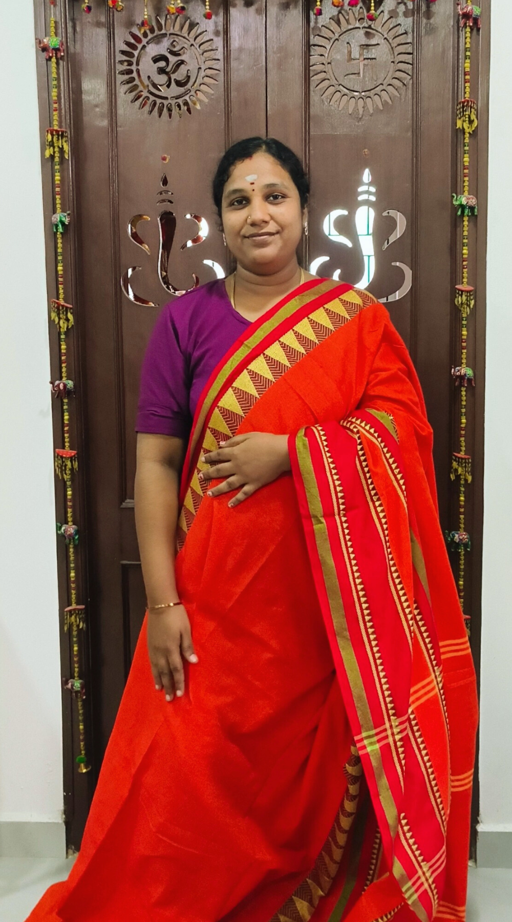Orange Elegant Cotton Handloom Saree with Kanchi-Style Temple Border